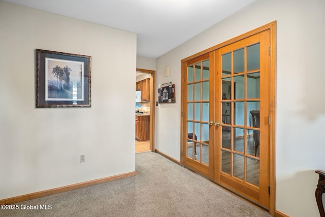 77 Rotterdam Dr, Bethlehem, NY 12077 - spare room featuring french doors and carpet