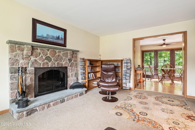 77 Rotterdam Dr, Bethlehem, NY 12077 - living room with carpet floors, a fireplace, and ceiling fan