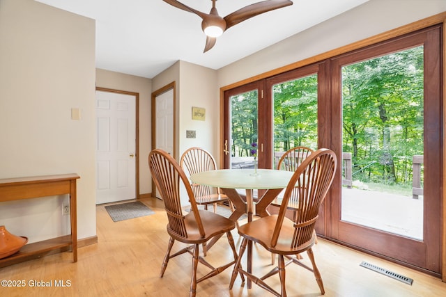 77 Rotterdam Dr, Bethlehem, NY 12077 - dining area featuring light wood-type flooring and ceiling fan