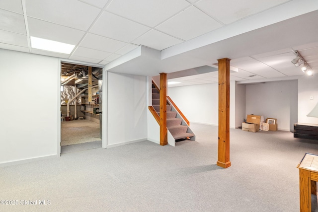 77 Rotterdam Dr, Bethlehem, NY 12077 - finished basement featuring a paneled ceiling, carpet flooring, stairway, and track lighting