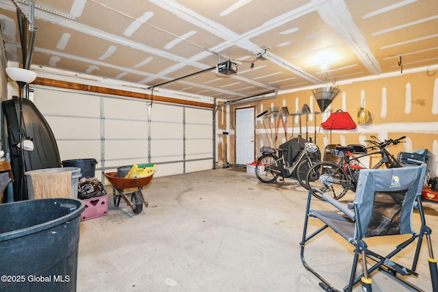 77 Rotterdam Dr, Bethlehem, NY 12077 - garage with a garage door opener