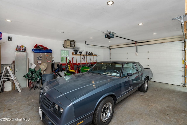 47 Comely Ln, Colonie, NY 12110 - garage with a garage door opener and recessed lighting