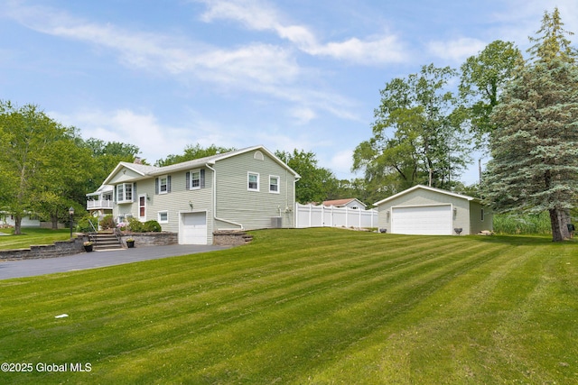 47 Comely Ln, Colonie, NY 12110 - view of yard with a detached garage and an outdoor structure