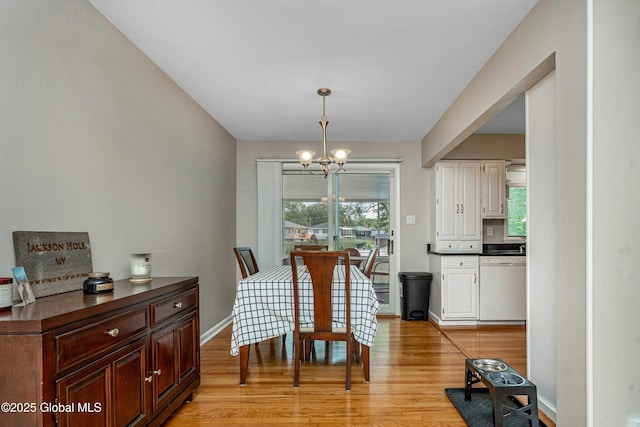 47 Comely Ln, Colonie, NY 12110 - dining room with a chandelier and light wood finished floors