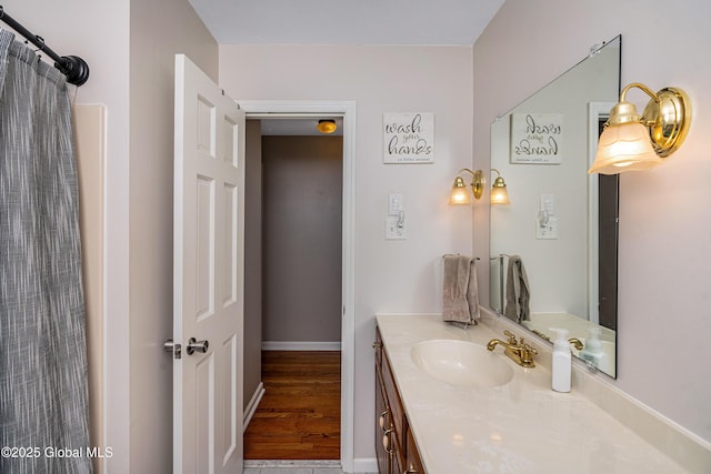47 Comely Ln, Colonie, NY 12110 - full bath with vanity and wood finished floors