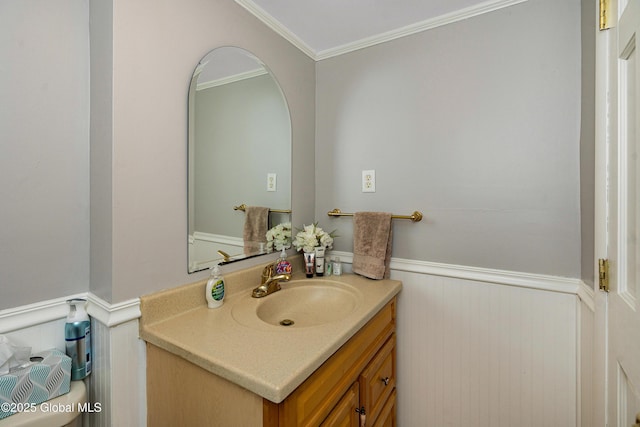 47 Comely Ln, Colonie, NY 12110 - bathroom with wainscoting, vanity, and ornamental molding