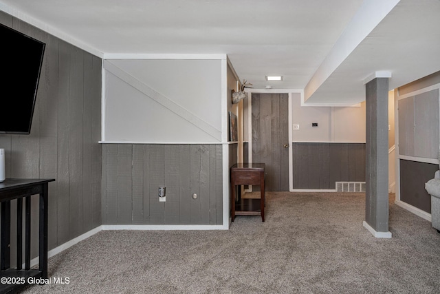 47 Comely Ln, Colonie, NY 12110 - interior space featuring carpet floors and wooden walls
