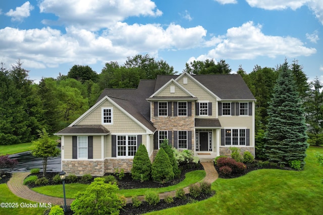 1 Arbor Dr, Guilderland, NY 12159 - view of front of home featuring stone siding and a front lawn