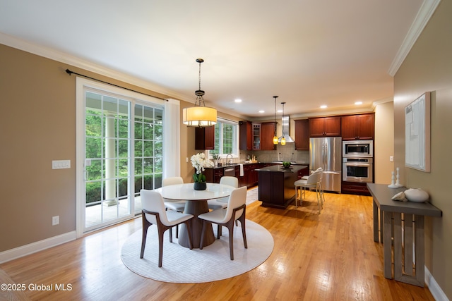1 Arbor Dr, Guilderland, NY 12159 - dining room with crown molding, light wood-style flooring, and recessed lighting