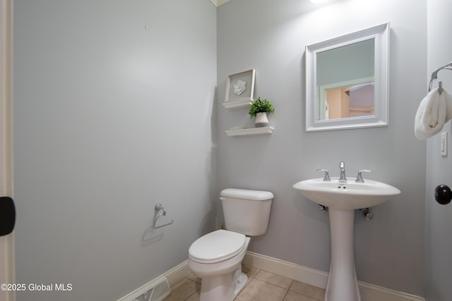 1 Arbor Dr, Guilderland, NY 12159 - half bath featuring toilet and tile patterned flooring