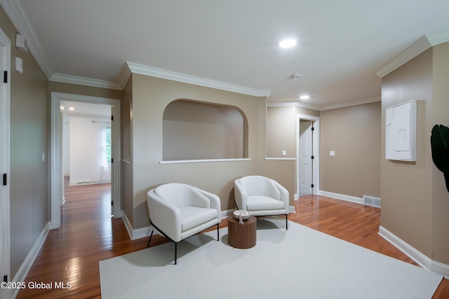 1 Arbor Dr, Guilderland, NY 12159 - living area featuring wood finished floors, recessed lighting, and crown molding