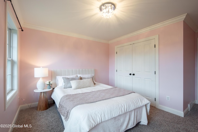 1 Arbor Dr, Guilderland, NY 12159 - carpeted bedroom with a closet, crown molding, and a chandelier