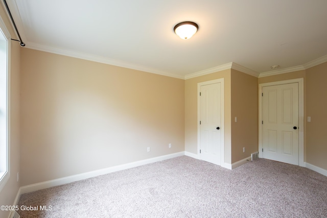 1 Arbor Dr, Guilderland, NY 12159 - unfurnished bedroom featuring crown molding, carpet flooring, and a closet