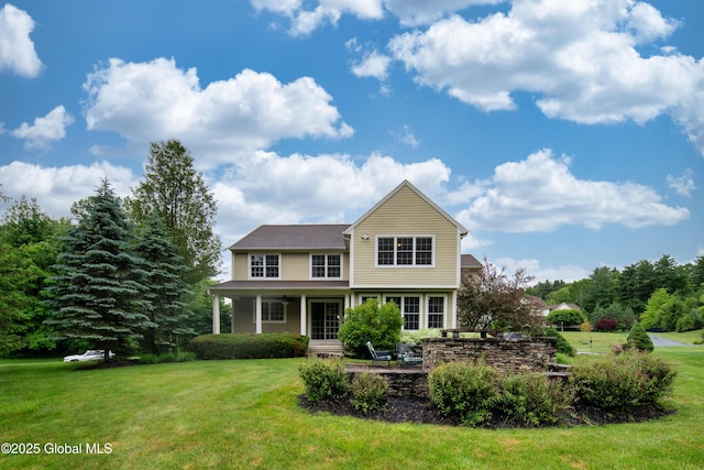1 Arbor Dr, Guilderland, NY 12159 - traditional-style home with a front yard and a patio area