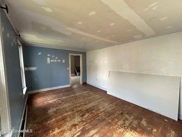 4 Factory St, Granville, NY 12832 - spare room featuring a barn door and hardwood / wood-style floors