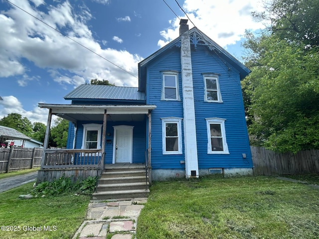 4 Factory St, Granville, NY 12832 - view of front of home featuring covered porch and a chimney