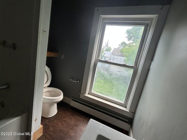 4 Factory St, Granville, NY 12832 - full bath with healthy amount of natural light, baseboard heating, and wood finished floors