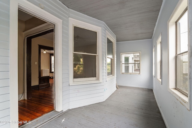 13 Barclay St, Albany, NY 12209 - unfurnished sunroom featuring radiator