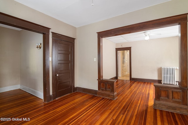 13 Barclay St, Albany, NY 12209 - spare room featuring radiator, wood-type flooring, and ceiling fan