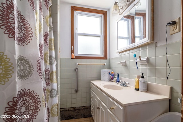 13 Barclay St, Albany, NY 12209 - bathroom with tile walls, vanity, curtained shower, and a wainscoted wall