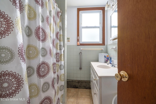 13 Barclay St, Albany, NY 12209 - full bathroom with vanity, tile patterned floors, tile walls, a shower with curtain, and a wainscoted wall
