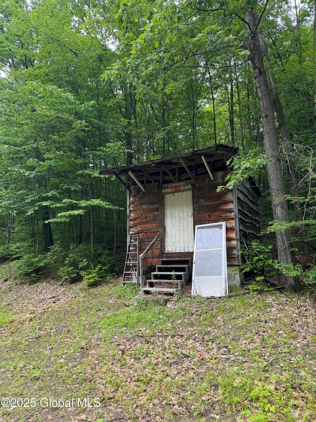 70 Cp A Way, Hartford, NY 12832 - view of outbuilding with a view of trees