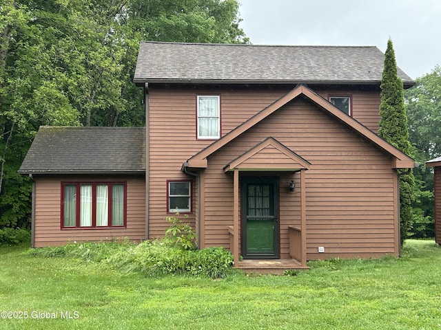 11 Ridgecrest Way, Hampton, NY 12887 - view of front facade with a front yard and a shingled roof
