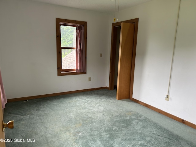 11 Ridgecrest Way, Hampton, NY 12887 - carpeted empty room featuring baseboards