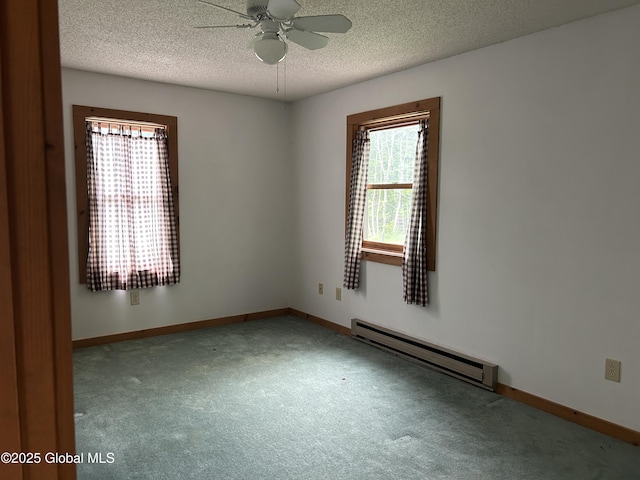 11 Ridgecrest Way, Hampton, NY 12887 - carpeted spare room with baseboard heating, a textured ceiling, and ceiling fan