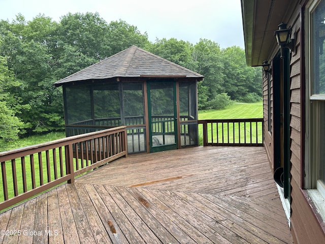 11 Ridgecrest Way, Hampton, NY 12887 - deck with a sunroom and a lawn