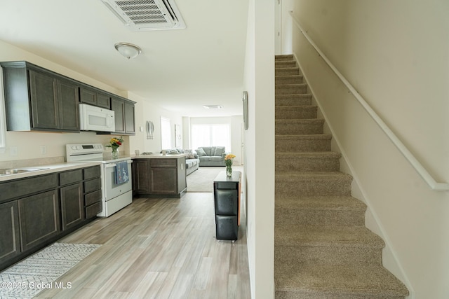 418 Summit Ave, Schenectady, NY 12307 - staircase featuring wood finished floors