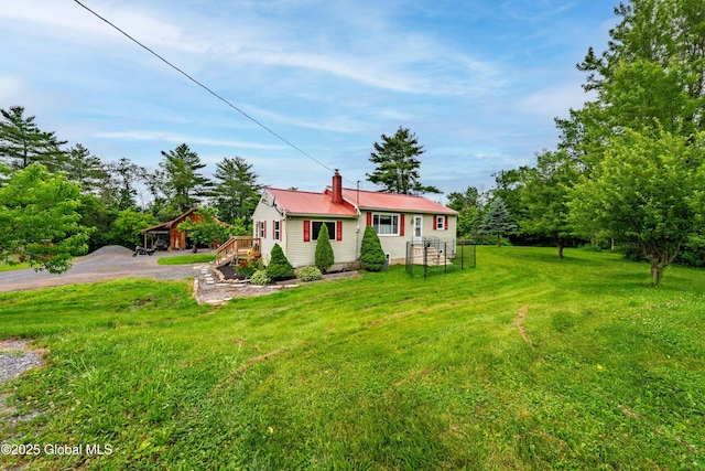 2560 Creek Rd, Esperance, NY 12066 - view of front facade with a front yard, a metal roof, and a chimney