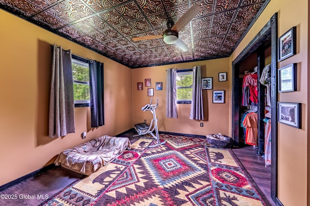 2560 Creek Rd, Esperance, NY 12066 - bedroom featuring an ornate ceiling, wood finished floors, and a ceiling fan