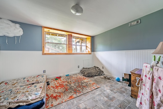 2560 Creek Rd, Esperance, NY 12066 - bedroom featuring a wainscoted wall