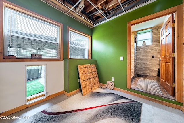 2560 Creek Rd, Esperance, NY 12066 - entryway with baseboards and tile patterned floors