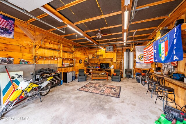 2560 Creek Rd, Esperance, NY 12066 - garage with a workshop area and wooden walls