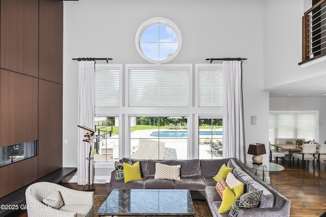 23 Steeple View Dr, Colonie, NY 12211 - living area featuring a towering ceiling and wood finished floors