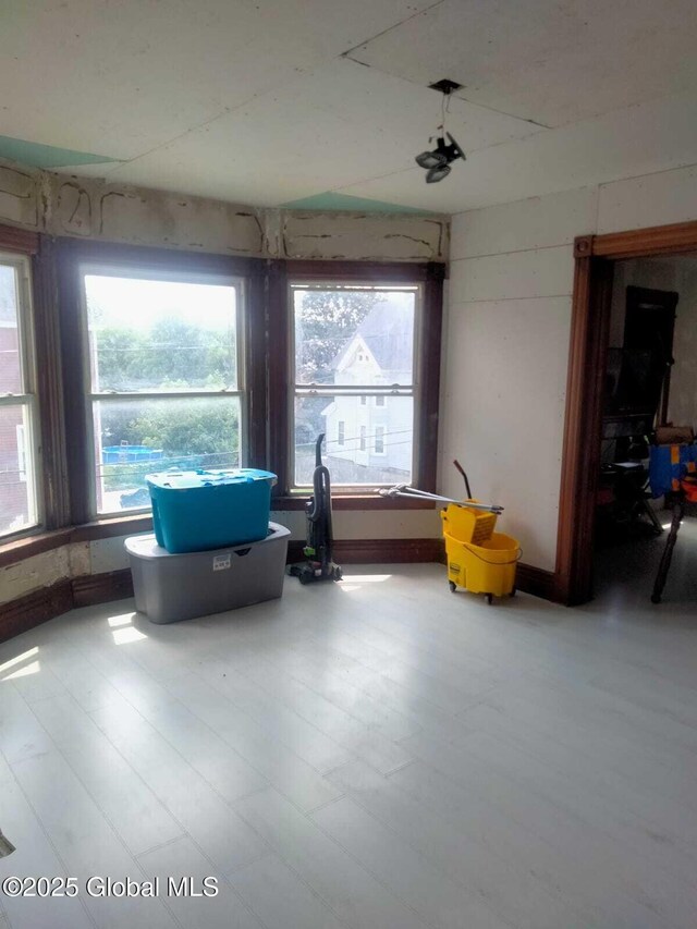 327 E Main St, Amsterdam, NY 12010 - living area featuring healthy amount of natural light and wood finished floors