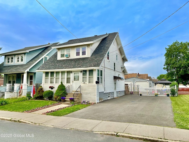 421 Michigan Ave, Schenectady, NY 12303 - view of front of house with roof with shingles, an outdoor structure, and entry steps