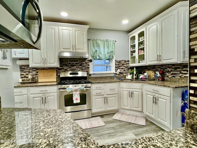 421 Michigan Ave, Schenectady, NY 12303 - kitchen with appliances with stainless steel finishes, white cabinets, light wood-style floors, and recessed lighting