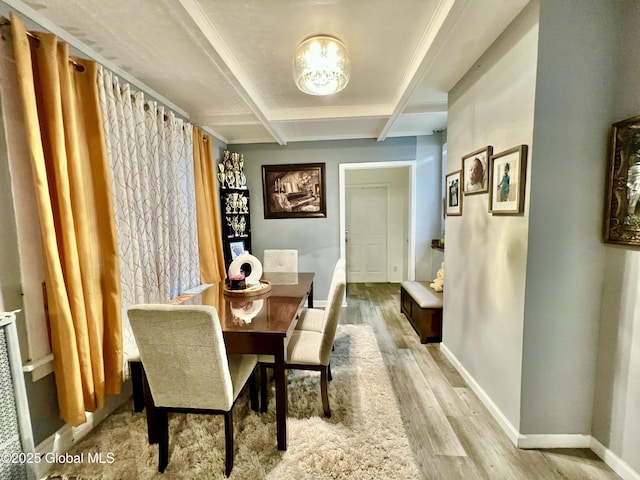 421 Michigan Ave, Schenectady, NY 12303 - dining room with light wood-type flooring, beam ceiling, and coffered ceiling