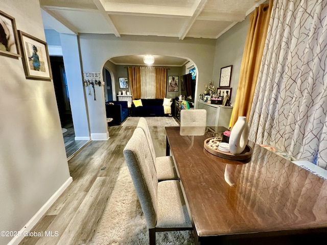 421 Michigan Ave, Schenectady, NY 12303 - dining area featuring arched walkways, wood finished floors, coffered ceiling, and beam ceiling