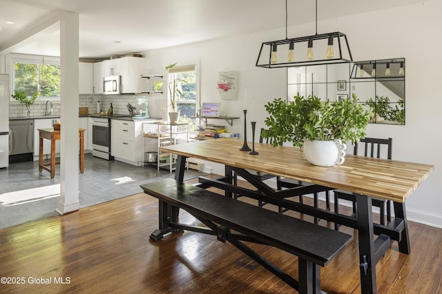 12 Mill St, Chatham, NY 12037 - dining room with dark wood-type flooring