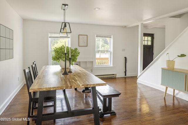 12 Mill St, Chatham, NY 12037 - dining area with wood finished floors and a baseboard radiator