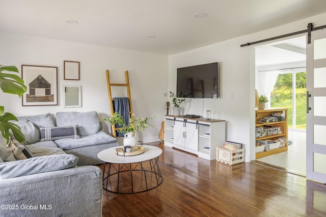 12 Mill St, Chatham, NY 12037 - living area featuring hardwood / wood-style flooring, a barn door, and recessed lighting