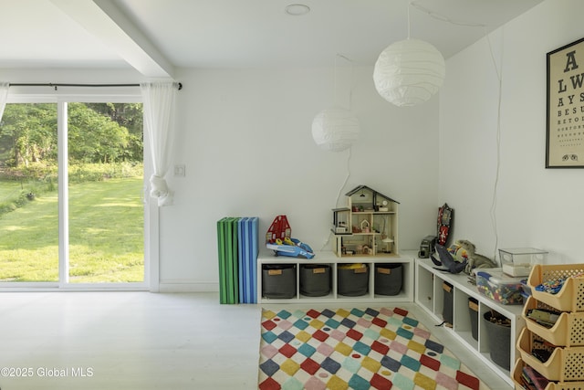 12 Mill St, Chatham, NY 12037 - rec room with wood finished floors