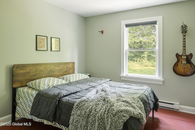 12 Mill St, Chatham, NY 12037 - bedroom with a baseboard radiator and wood finished floors