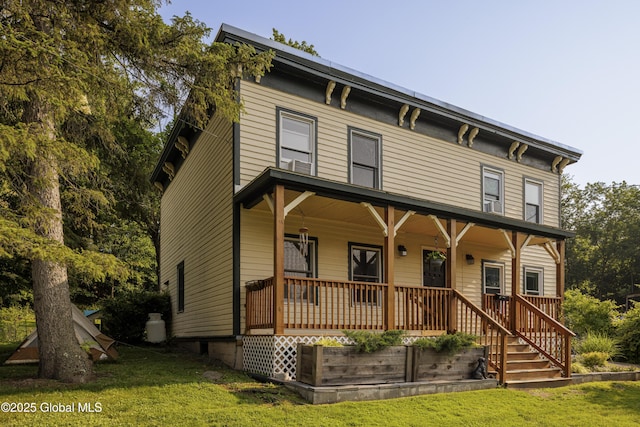 12 Mill St, Chatham, NY 12037 - italianate home with covered porch and a front lawn