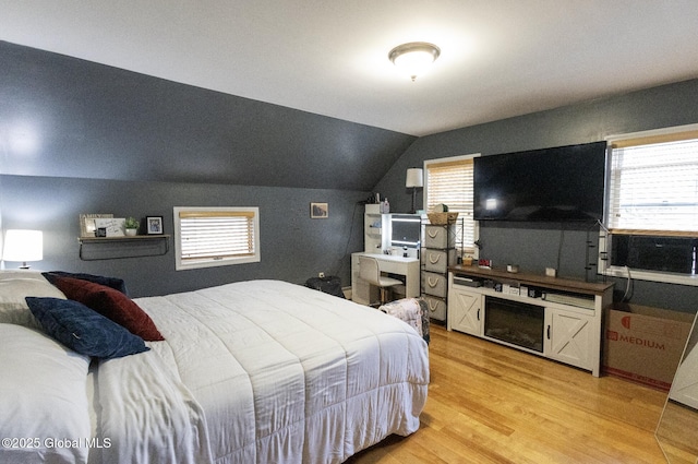 74 Feeder St, Hudson Falls, NY 12839 - bedroom featuring light wood-type flooring and lofted ceiling