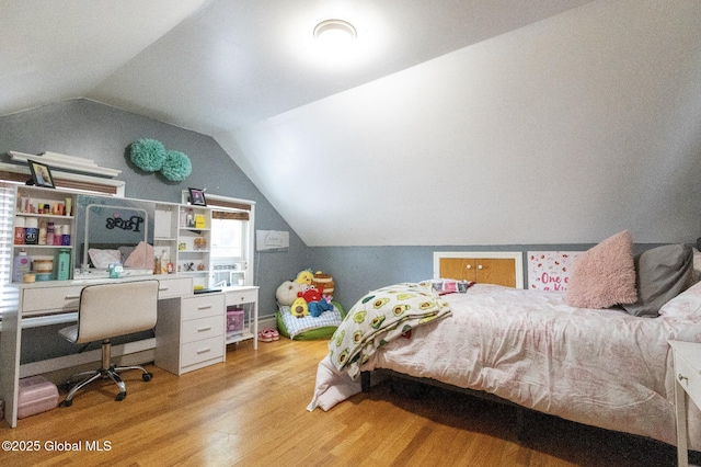 74 Feeder St, Hudson Falls, NY 12839 - bedroom with light wood-style floors, vaulted ceiling, a desk, and baseboard heating